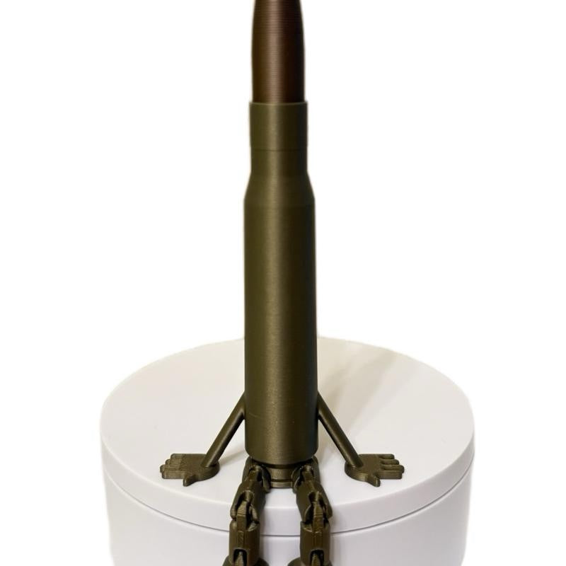 50BMG Shell Figurine: Flexible legs, fun desk decor!